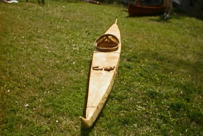 Greenland Inuit Kayak, photographed on grass. 